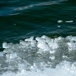 Ice crystals formation on a dark surface
